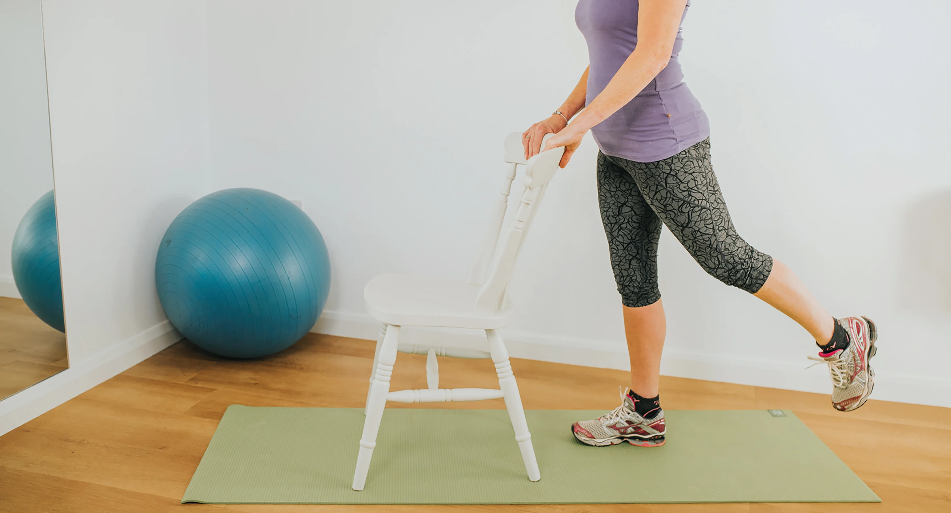 a person standing on a stool